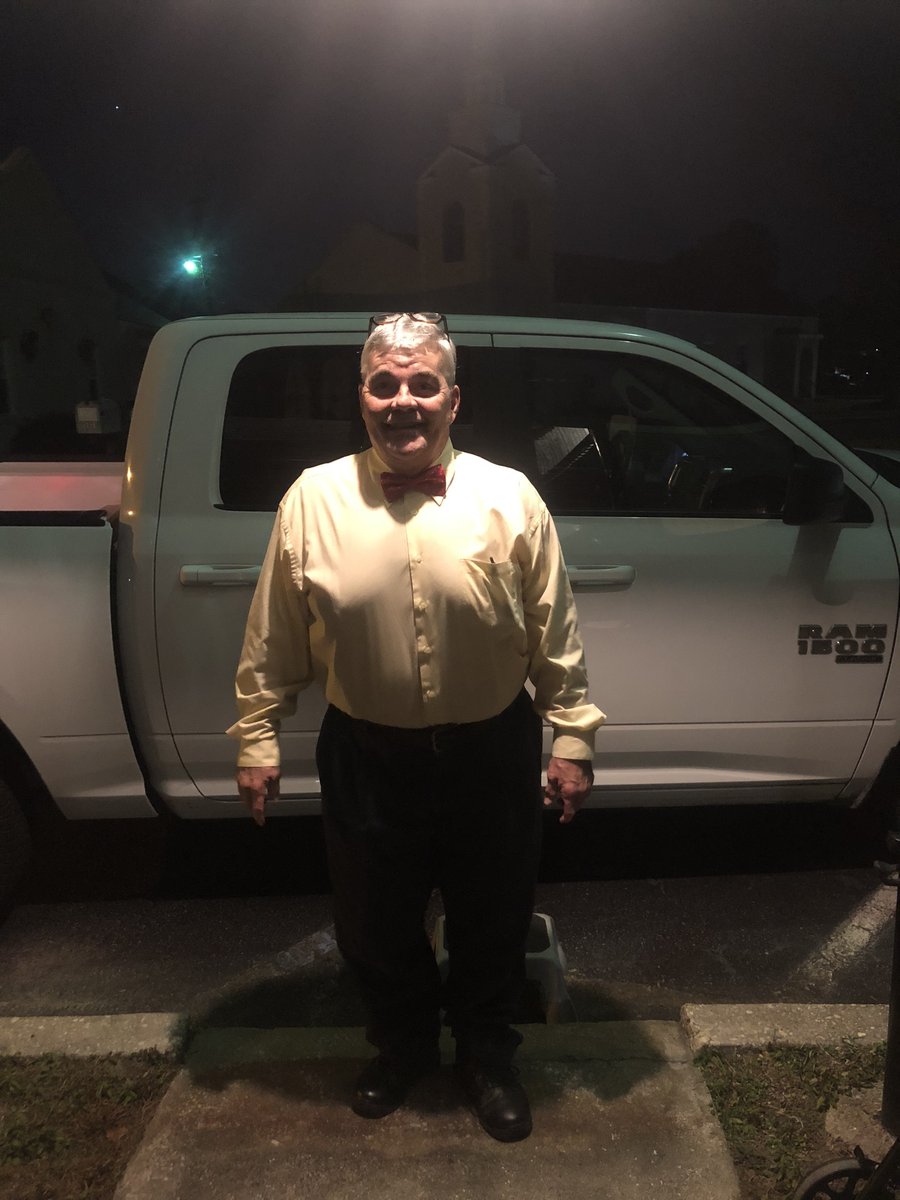 Pastor Buddy Burnett outside Connections Community Church in the evening
